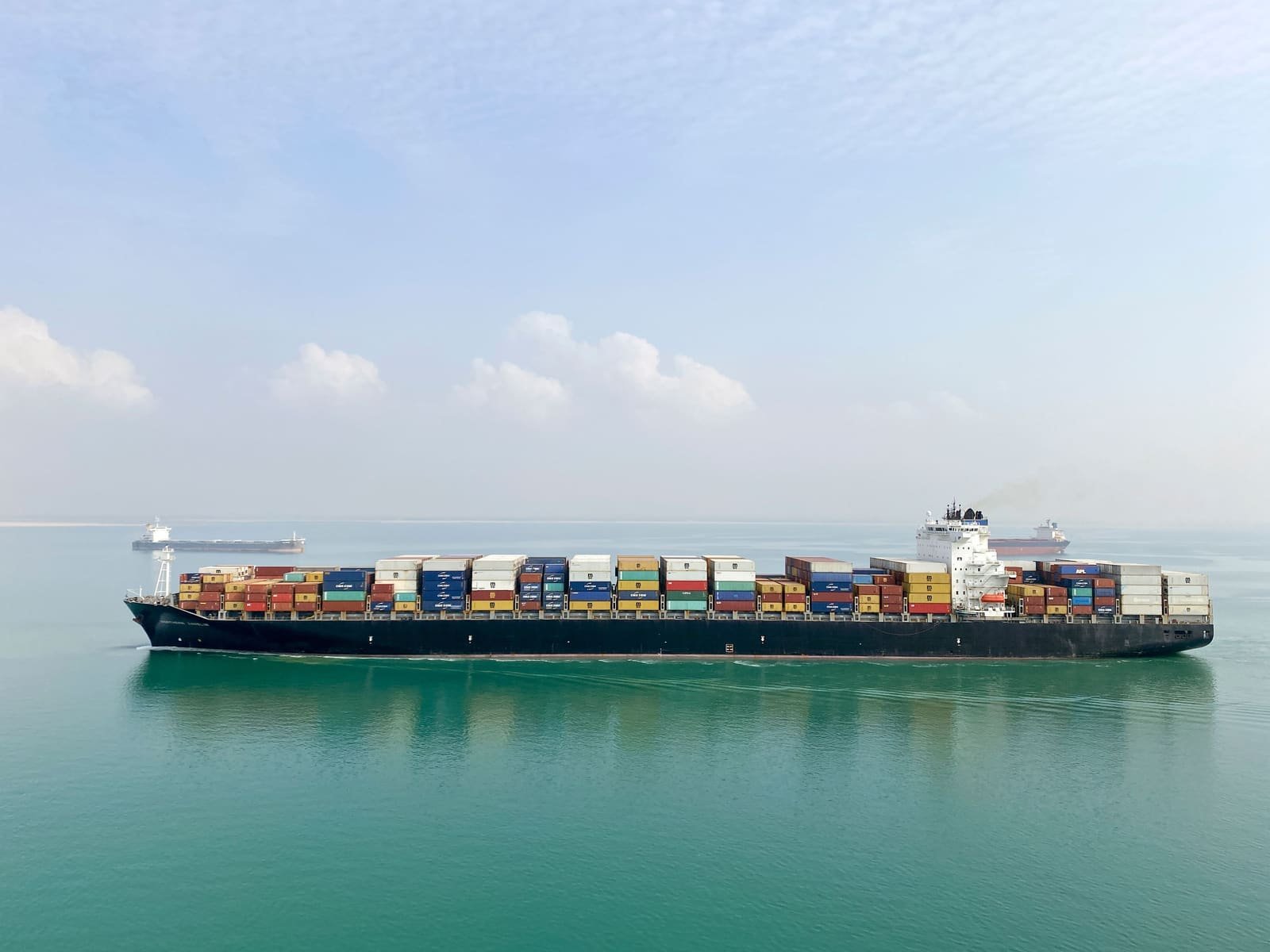 Container ship carrying freight at sea